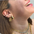 Piercing de Pressão Fake com Zircônias Cravejadas - Banho em Ouro 18K