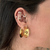 Brinco Argola Lisa Invertida Dourado - Banho em Ouro 18K - comprar online