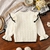 sweater crema con volados en internet