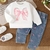 Conjunto jean con buzo en internet
