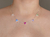 Choker Triângulo Colors na internet