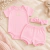 Conjunto Bebê Body e Shorts Canelado com Faixa - comprar online
