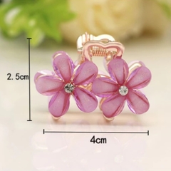 2 presilhas de flor em ferro com acabamento dourado e flores coloridas