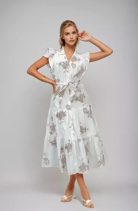 Descubre el Vestido Midi Bordado Sin Manga