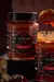 Frasco do molho de tomate Buonissimo com visual rústico e rótulo artesanal