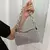 BOLSA FEMININA COM ALLOVER STRASS - loja online
