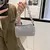 BOLSA FEMININA COM ALLOVER STRASS - comprar online