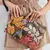 BOLSA CROSSBODY FLORES DE PRAIA