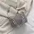 BOLSA FEMININA COM ALLOVER STRASS na internet