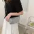 BOLSA FEMININA COM ALLOVER STRASS na internet