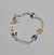 Pulseira borboleta com zirconia colorida 17,5 cm - comprar online