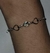 Pulseira infantil 2 coraçoes vazados e 1 coração zirconia - comprar online