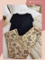Pijama blusa de ribana detalhe de botão e calça de softh fluido de bolso.