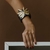Bracelete Folha Preto Dourado - comprar online