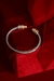 Bracelete em titânio com ponteiras