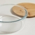 TUPPER DE VIDRIO REDONDO CON TAPA DE BAMBOO 940 ML en internet