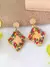 ARETES LARGOS ACERO DORADO REF.151-30
