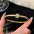 Pulseira de Aço Inoxidável com Titânio Incrustado e Zircão Banhado a Ouro – Clássica, Minimalista e Perfeita para o Uso Diário - comprar online