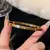 Pulseira de Aço Inoxidável com Titânio Incrustado e Zircão Banhado a Ouro – Clássica, Minimalista e Perfeita para o Uso Diário - comprar online