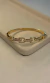 BRACELETE DOURADO COM ELOS CRAVEJADOS