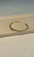 BRACELETE TORCIDO DOURADO