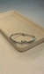 BRACELETE CRAVEJADO COM ANÉIS