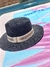 Sombrero de rafia - negro con cinta en internet