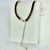 Colar Choker Riviera Baguetes de Cristais Negros no Dourado na internet