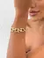 Pulseira em verniz italiano com zircônias banhada em 10 milésimos de ouro 18k