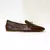 Loafer em verniz com detalhe em metal dourado na internet
