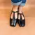Sapatilha slingback em verniz na internet