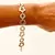 Pulsera de plata / Círculos facetados y flores - comprar online