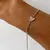 Pulsera de plata / Bolitas y mariposa - comprar online