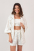 camisa oversized com botão listrada