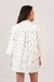 camisa oversized com botão listrada
