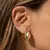BRINCO FOLHEADO LISO MEIA LUA DOURADO