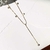 Colar gravatinha com zirconias - comprar online