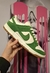 Dunk blanca y verde de gamuza