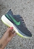 Invencible Run gris y verde
