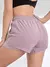 Imagem do Shorts esportivos elásticos femininos, shorts com bolsos, leggings falsas de io