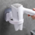 Soporte autoadhesivo para secador de pelo
