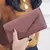 Céleb BellaFold™ - Carteira com Botão e Estilo na internet