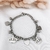 Pulsera con Coronas y Bolitas A.Q. - comprar online