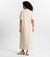 Mulher usando o Vestido Longo Essencial branco da MR & Co., produzido em algodão macio com toque leve e design minimalista. Vestido sustentável, confortável e versátil, pensado para mulheres que valorizam o essencial com sofisticação e propósito.