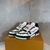 louis vuitton lv trainer strap red white - comprar en línea