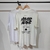 Remera Over Never Alone