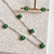 Conjunto flor com pedras verde esmeralda - comprar online
