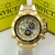 Relógio Invicta Skeleton Noma lll Skull Dourado Branco a prova dágua