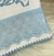 Fralda de Boca Quadriculada Premium Renda Azul Bebê – Cavalo Carrossel com Flores e Laço - comprar online
