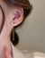 Aretes largos de mariposa y brillitos